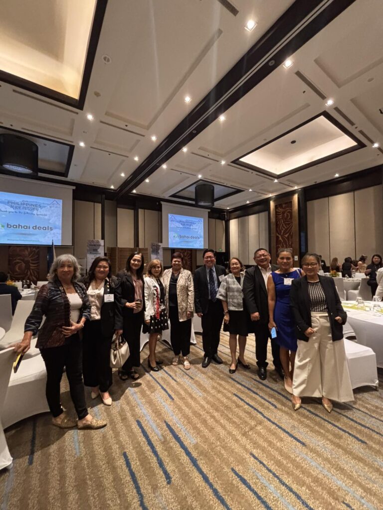 The team from NOW Realty and Brokerage posing for a group photo together at the Global Forum event.