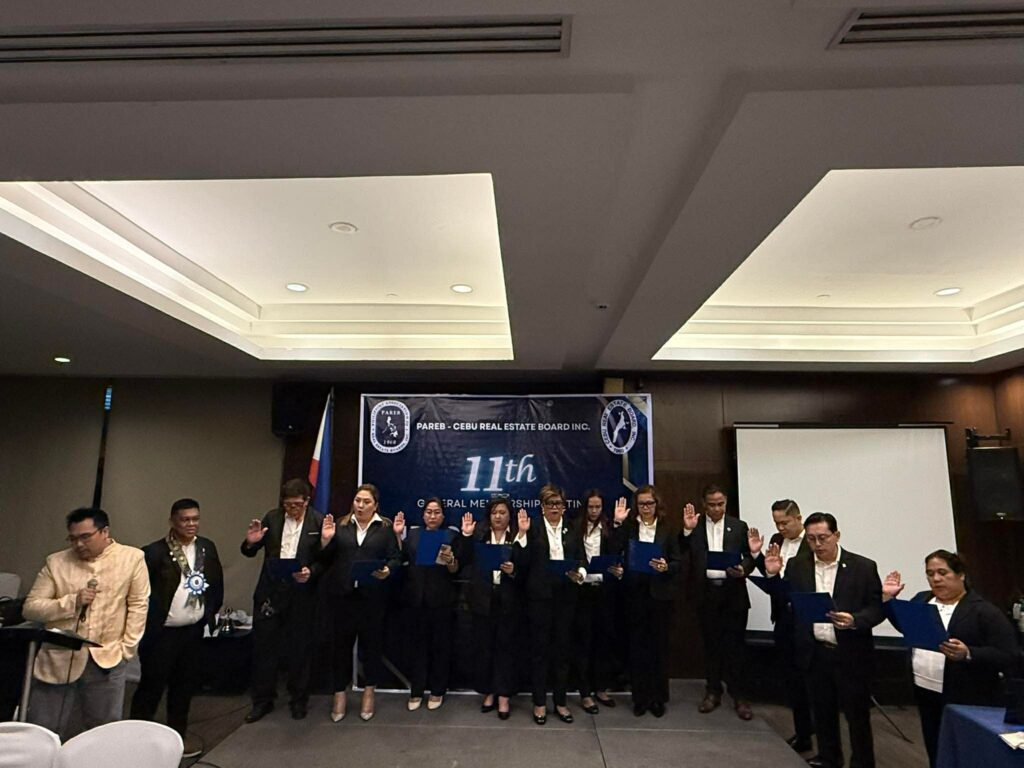 NOW Realty Managing Broker with the newly inducted CEREB officers and members at the networking event.