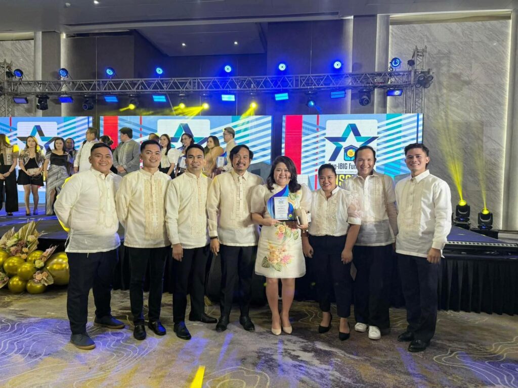 NOW Realty and Bayanihan Flats team members celebrating the Pag-IBIG Fund Top Developer award at the 2024 Stakeholders event.